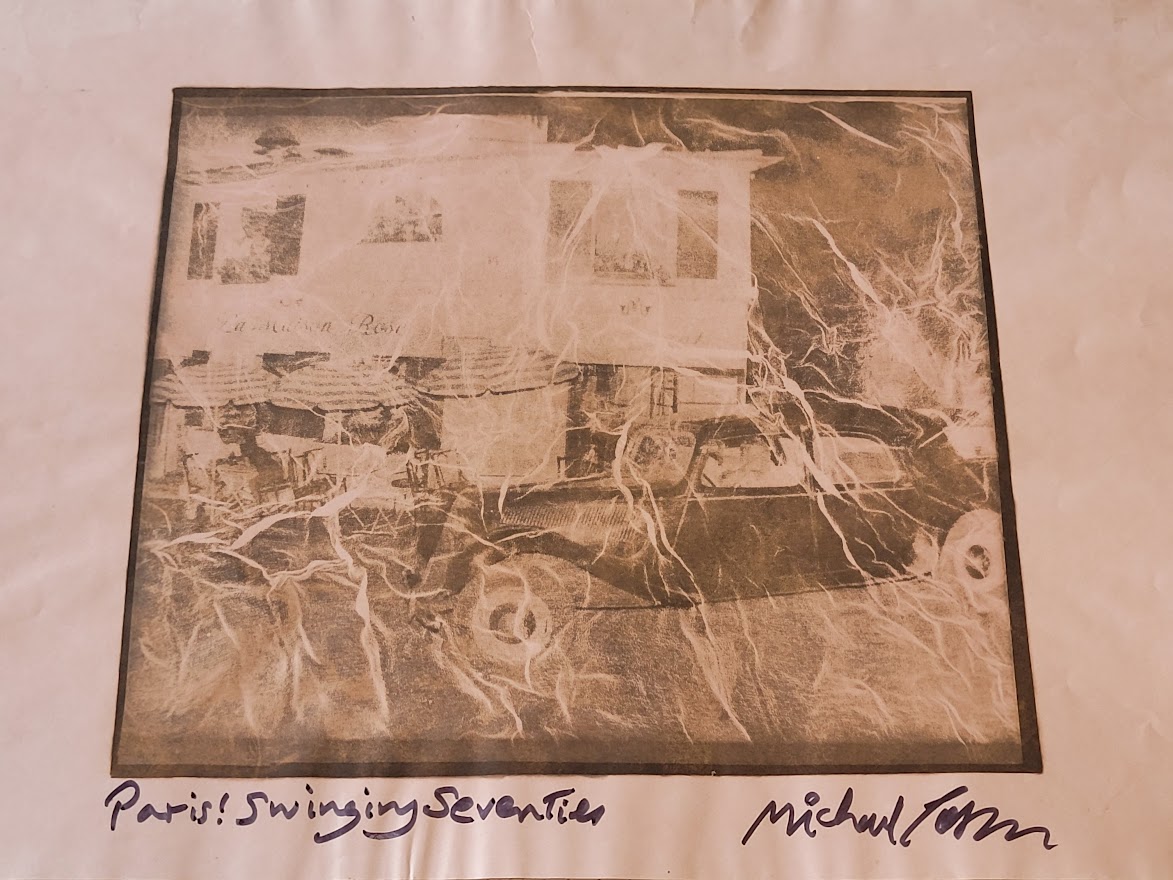 Paris, old car in front of la maison rose, pink underwater ripple effect artistic version by Michael Joseph