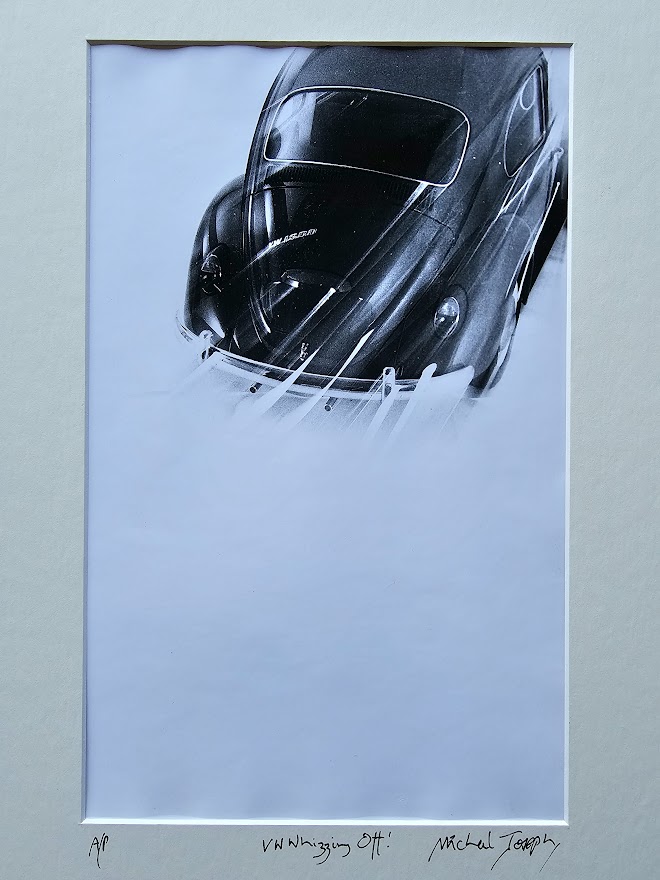 Studio shot of a Volkswagen Beetle whizzing off, by Michael Joseph