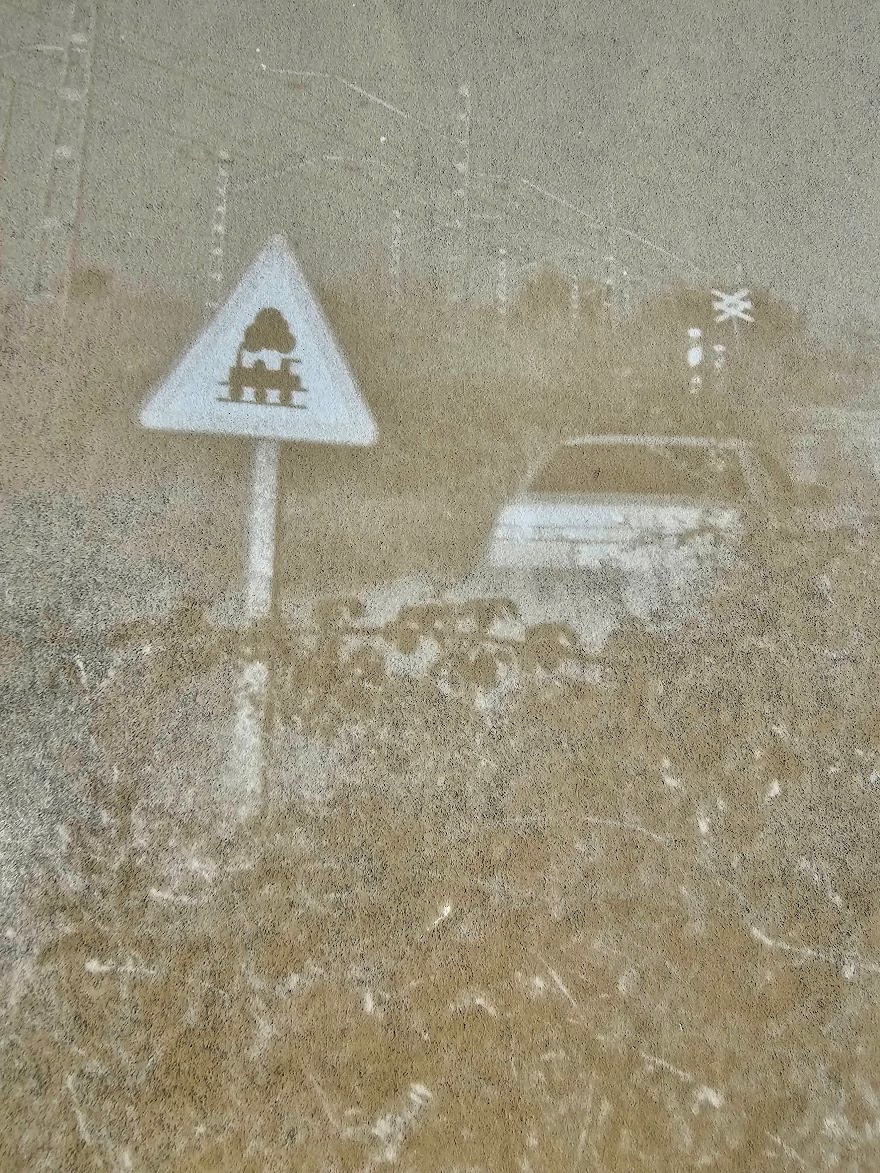 Railway siding artistic train signpost on the way to Figueras near Cadaques atention al tren artistic edition by Michael Joseph