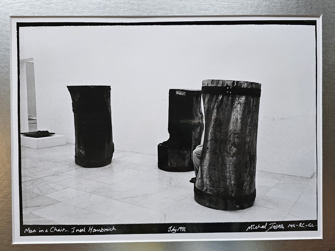 Man in a chair - Insel Hombroich, black and white darkroom print on glossy paper by Michael Joseph