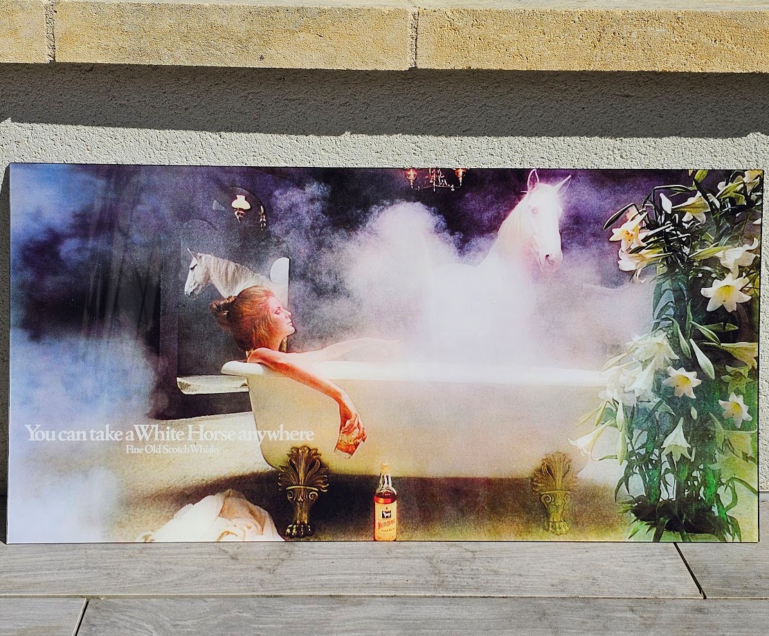 White Horse whisky you can take a white horse anywhere, advertisement from the seventies, girl in bath in colour by Michael Joseph