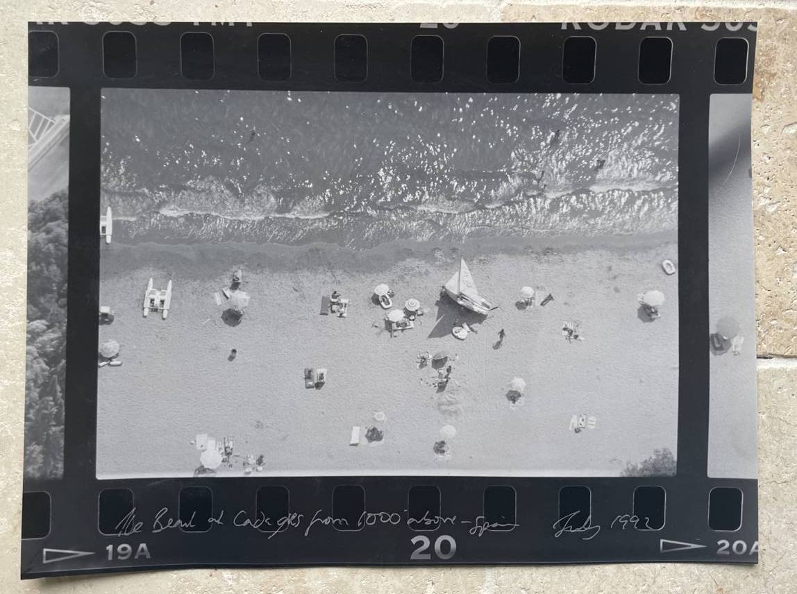 Overhead shot of Cadaques Beach, print with the negative border apparent by Michael Joseph