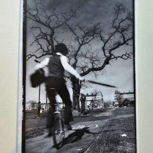 Clapham Unicyclist - commuter on way to work, black and white darkroom print on Kodalith ultra-thin paper, by Michael Joseph