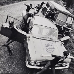 Sixties country roadblock, funky Acrilan clothing advert, rebellious sunglass-bearing gals' with vehicles by Michael Joseph