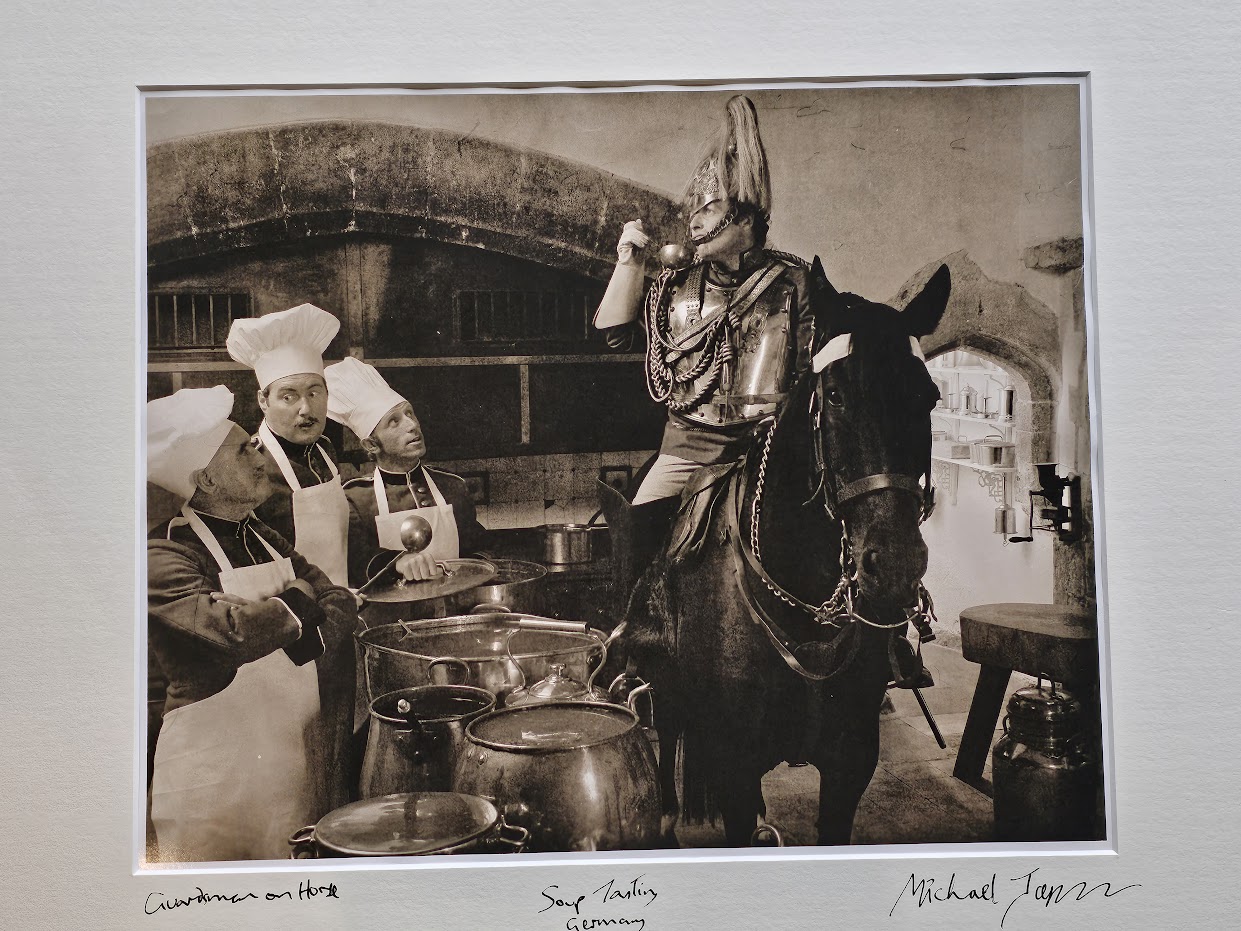 Guardsman on horseback and three chefs, Soup tasting in a German kitchen, advertisement test print by Michael Joseph