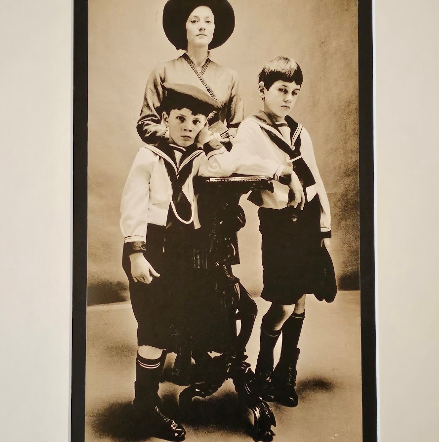 Pair of boys dressed as sailors with their mother, sepia tone by Michael Joseph