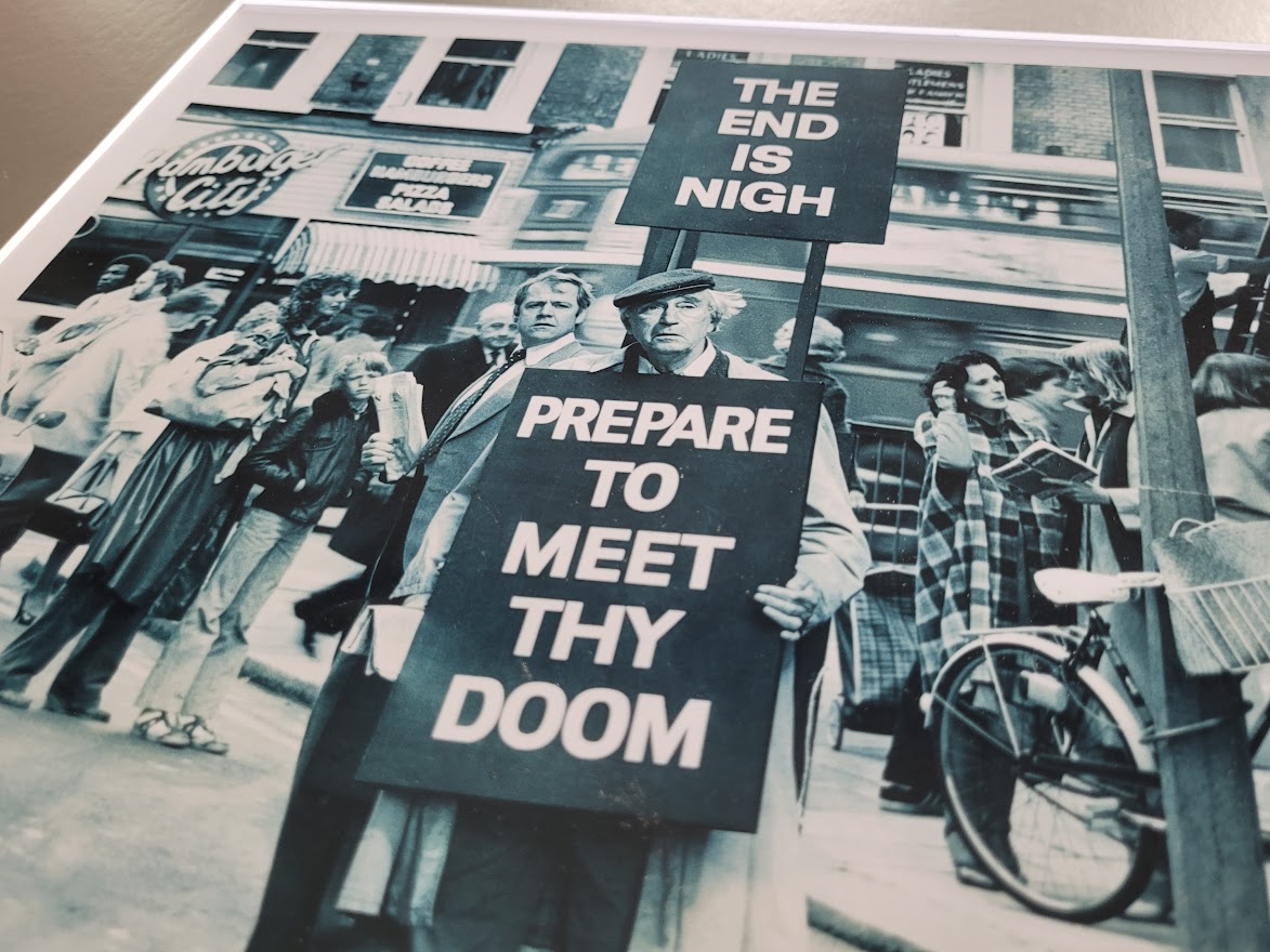The end is nigh - prepare to meet thy doom, unusual sixties street scene by Michael Joseph