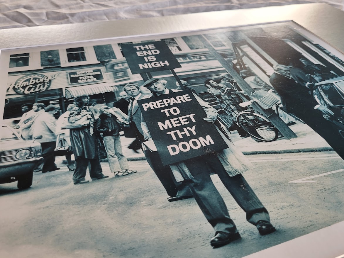 The end is nigh - prepare to meet thy doom, unusual sixties street scene by Michael Joseph