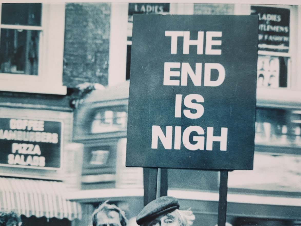 The end is nigh - prepare to meet thy doom, unusual sixties street scene by Michael Joseph