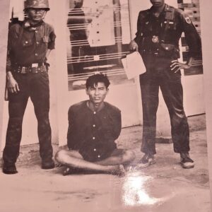 South Vietnam, soldiers with prisoner, poignant photograph taken in 1964 by Michael Joseph