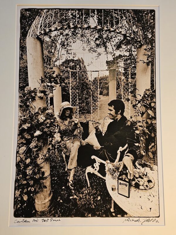 Cointreau advert, couple in folie pergola, metal structure with climbing rose vegetation and cast iron chairs by Michael Joseph