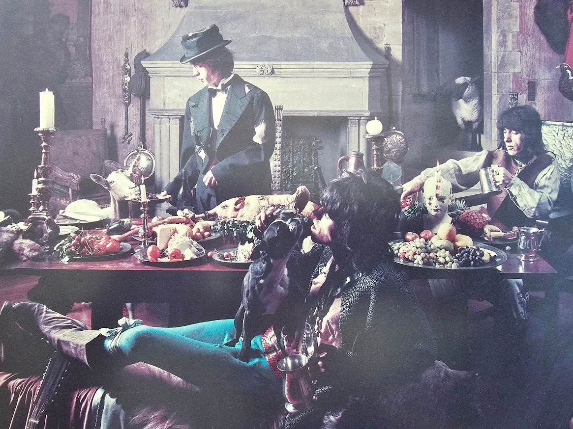 Mick Feeding Goat - Beggar's Banquet photo-shoot from 7th June 1968, featuring all of the Rolling Stones, by Michael Joseph