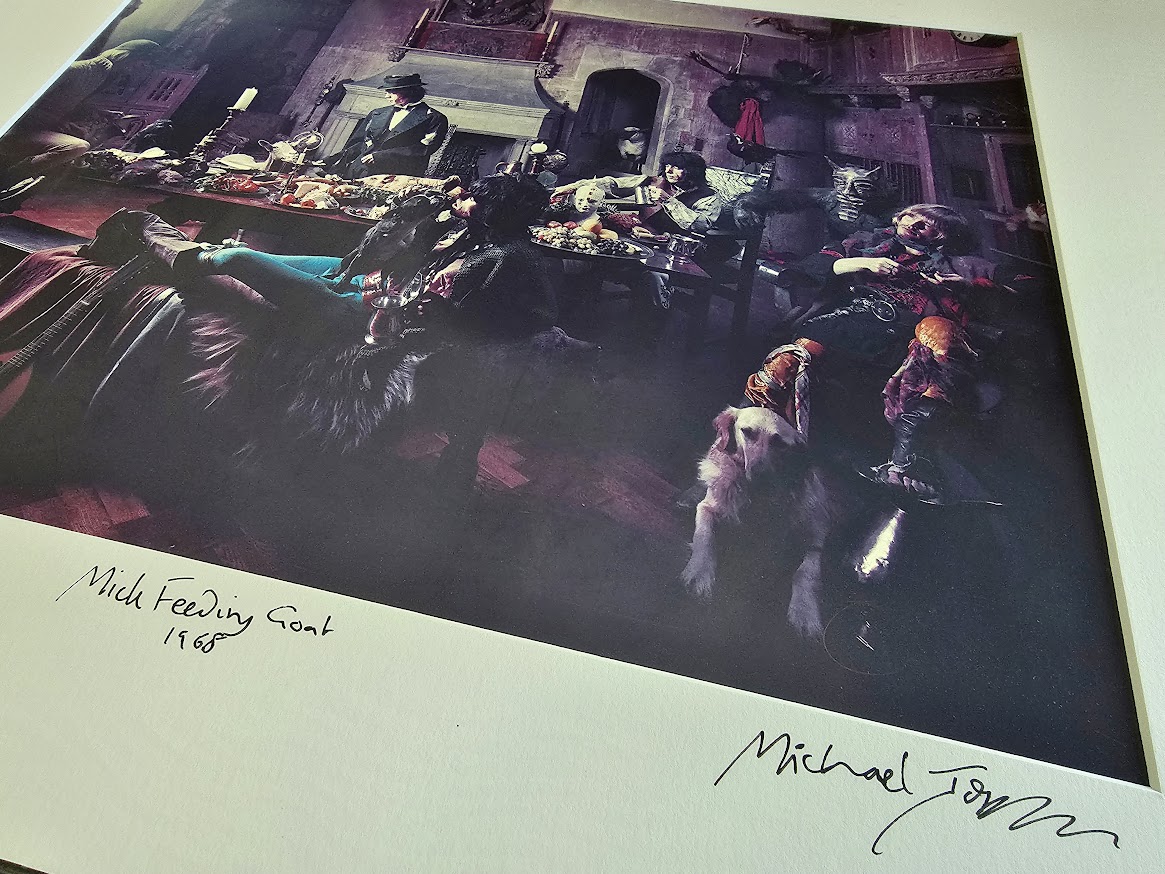 Mick Feeding Goat - Beggar's Banquet photo-shoot from 7th June 1968, featuring all of the Rolling Stones, by Michael Joseph