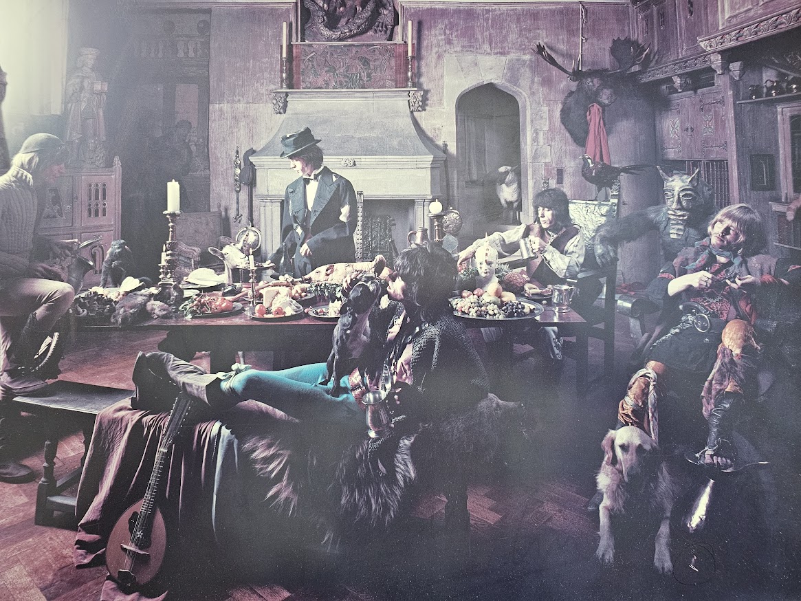 Mick Feeding Goat - Beggar's Banquet photo-shoot from 7th June 1968, featuring all of the Rolling Stones, by Michael Joseph