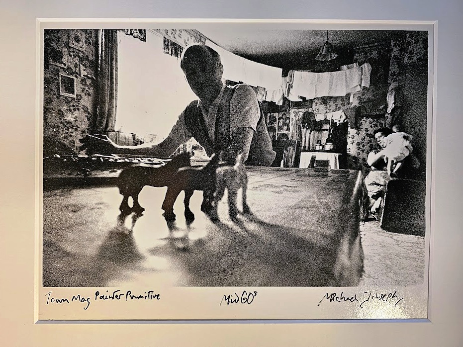 Painter for town magazine with his miniatures sixties stereotype test print by Michael Joseph