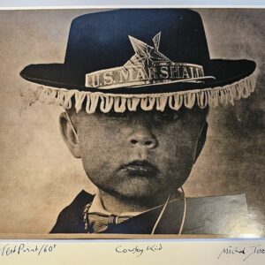 Cowboy kid - portrait of a young boy wearing a cowboy hat, test print by Michael Joseph