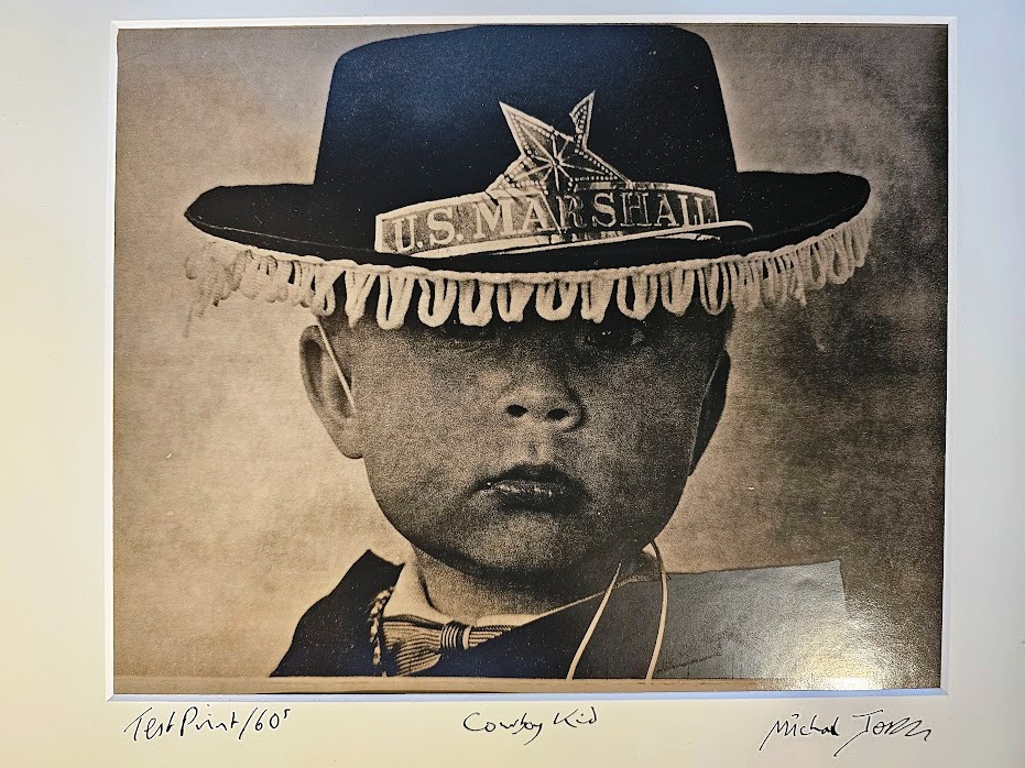 Cowboy kid - portrait of a young boy wearing a cowboy hat, test print by Michael Joseph