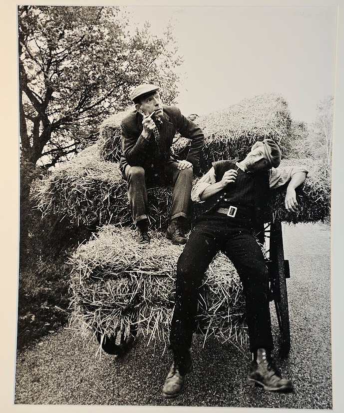 Pair of relaxed farmers, smoking on their hay bales, test print for an advert by Michael Joseph
