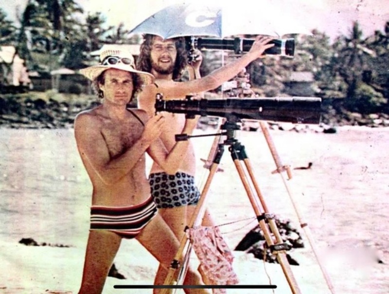 Michael Joseph and friend posing in their underwear behind cameras on tripods