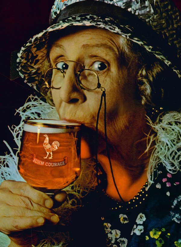 An elderly lady drinking a pint of beer