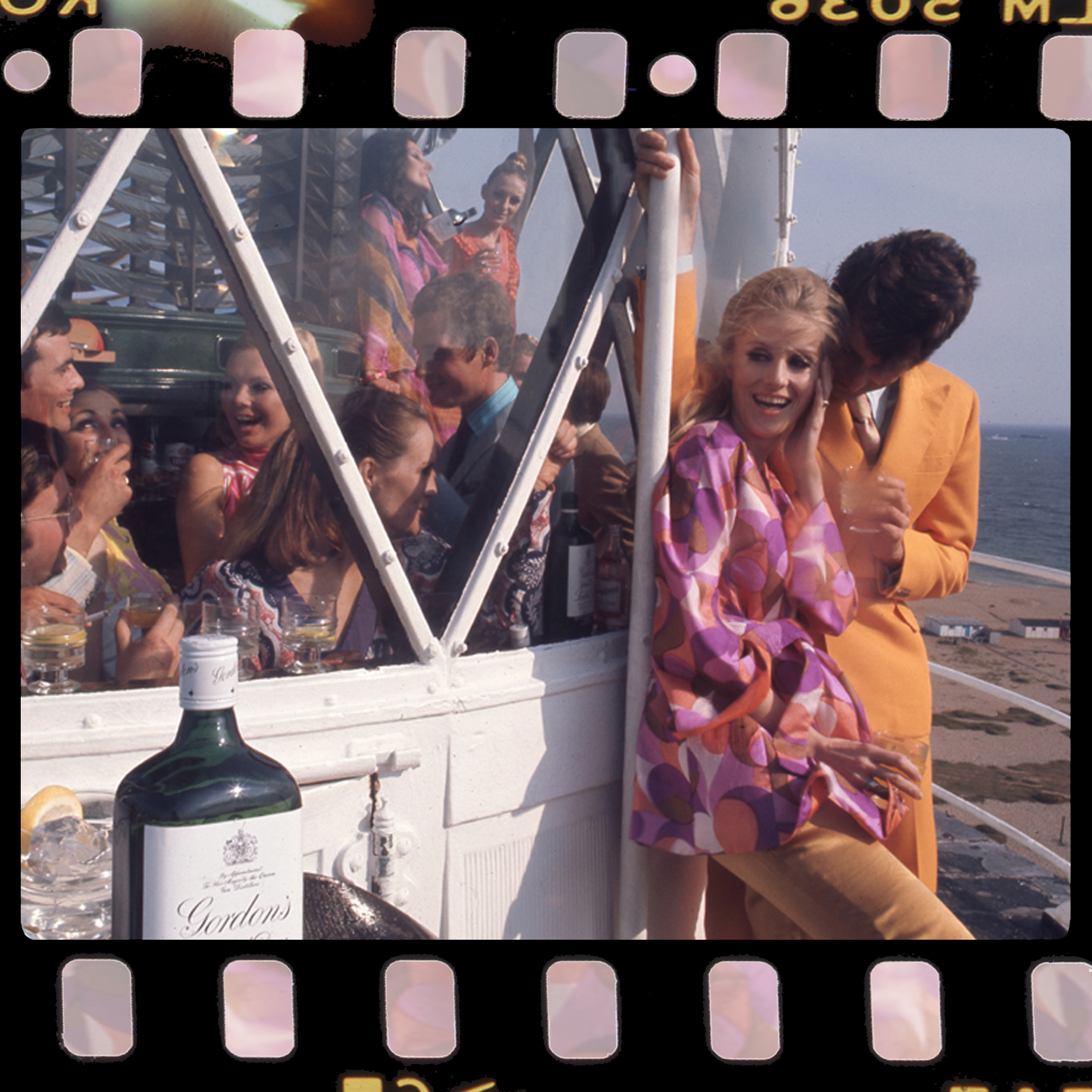 Lighthouse party for Gordon's Gin  – Alcohol Advertising Group Scene Postcard by Michael Joseph