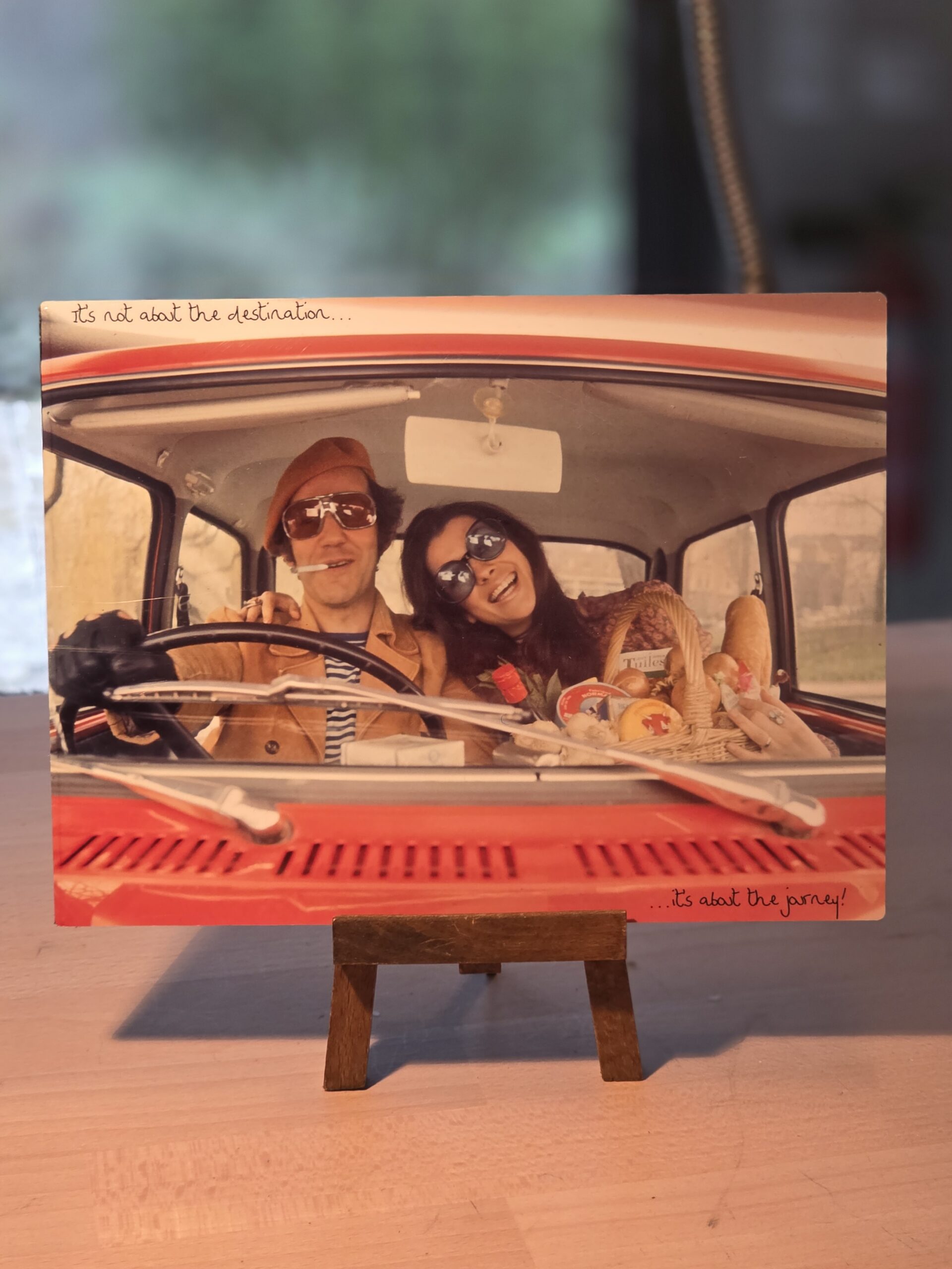 It's not about the destination, couple at wheel off off and away an out-take from a photo-shoot, gloss finish photo by Michael Joseph