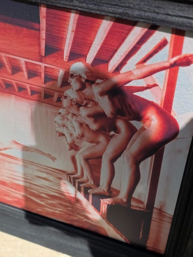 False start, pool ladies photo-shoot, red print on aluminium, Michael Joseph