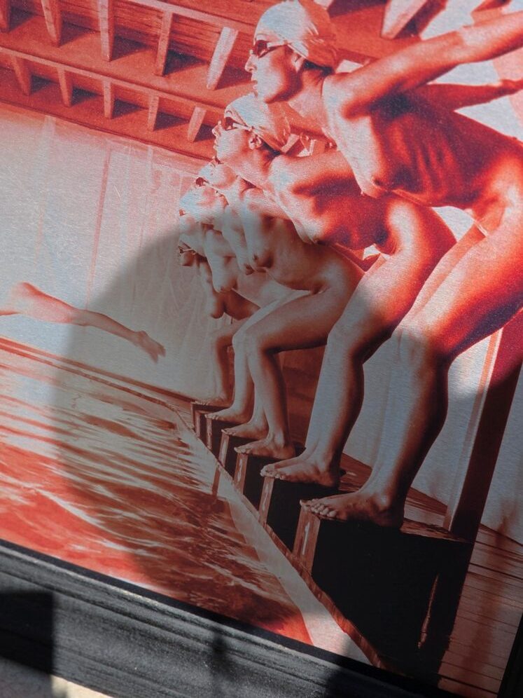 False start, pool ladies photo-shoot, red print on aluminium, Michael Joseph