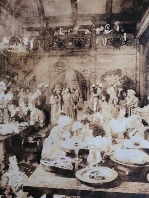 Group in Suits Drinking Offley Port at Knebworth House – Grainy Sepia-Toned Print by Michael Joseph