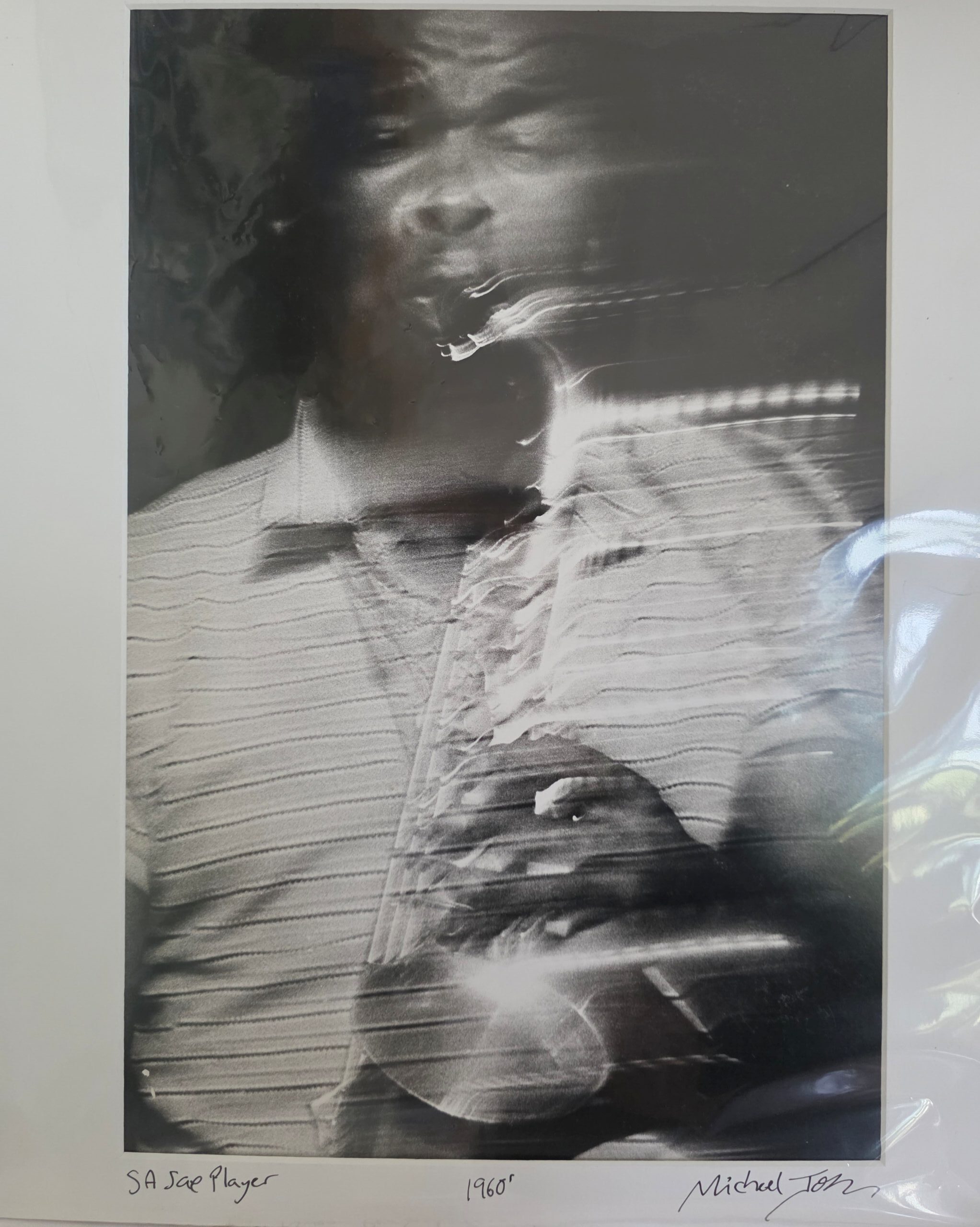 Joueur de saxophone en Afrique du Sud, Instant immortalisé par Michael Joseph